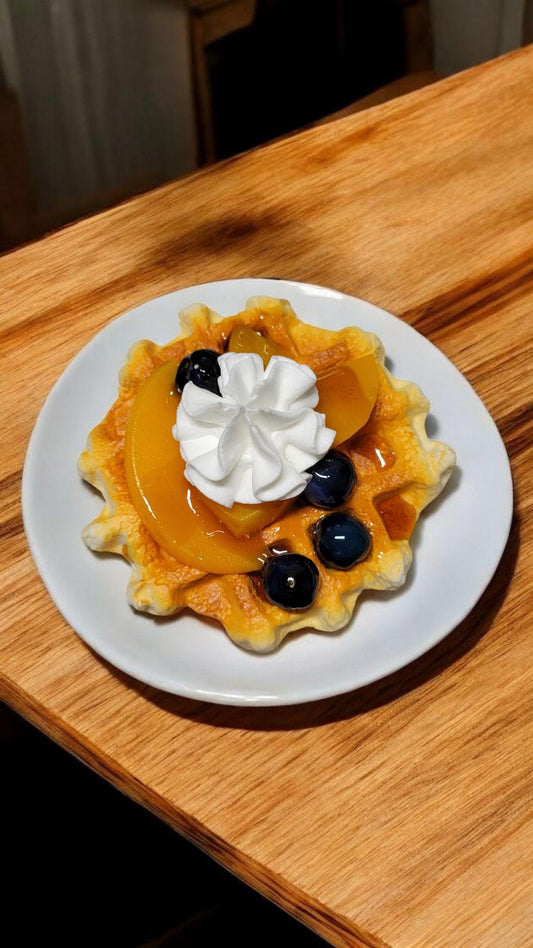 Zero calorie faux vanilla waffle with peaches and blueberries