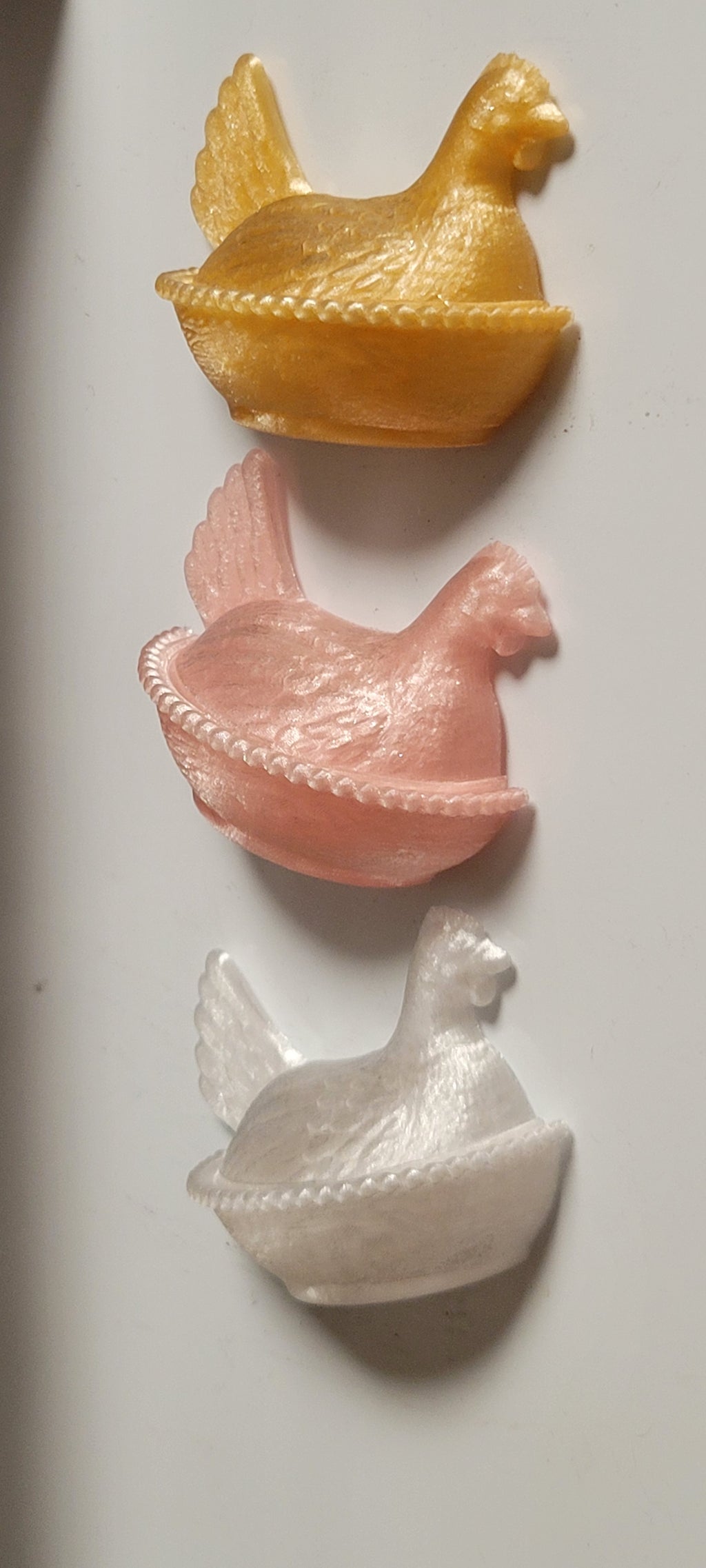 Hen on a nest fridge magnet